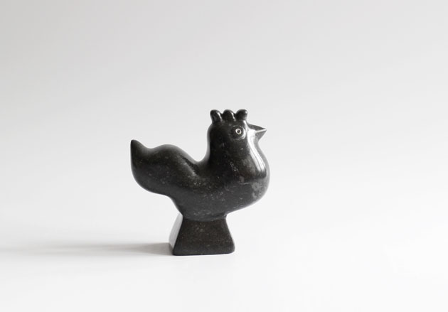Rooster stone sculpture