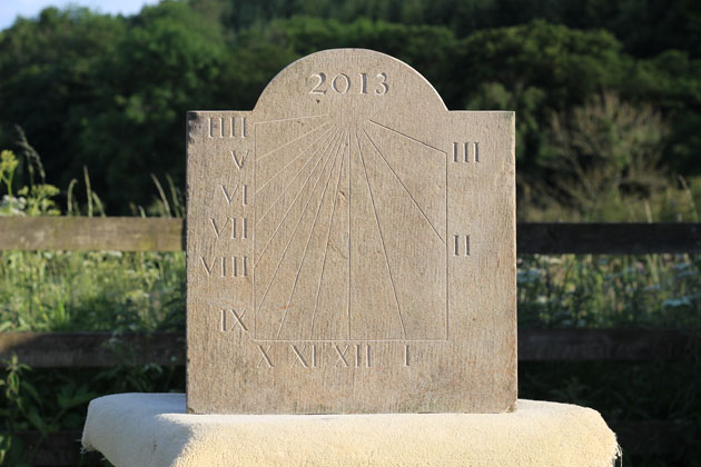 Sundial carved with numerals