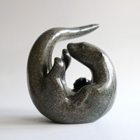 Playful Otter sculpture