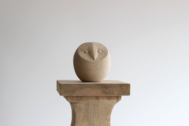 Small stone sculpture of an Owl